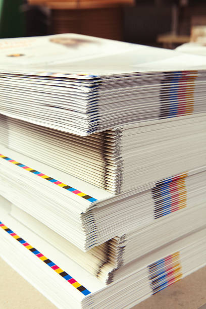 istock Stack of printed folders in the printing plant 585780890