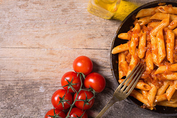 istock Penne Pasta  tagliatellei with tomato 585782224