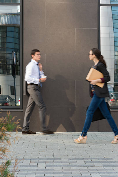 istock Businesspeople walking on the street 585783390