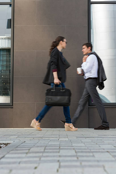 istock Businesspeople walking on the street 585783654