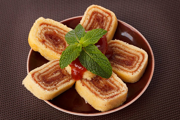 istock Bolo de rolo (swiss roll, roll cake) Brazilian dessert 585784630