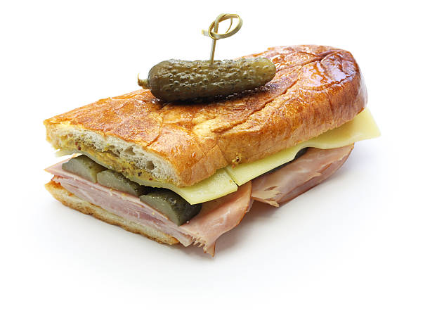 cuban sandwich, cuban mix, cuban pressed sandwich cuban sandwich, cuban mix, ham and cheese pressed sandwich isolated on white background cuban culture photos stock pictures, royalty-free photos & images