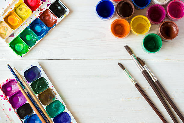 istock Painting set: brushes, paints, watercolor, acrylic paint on a wh 585787374