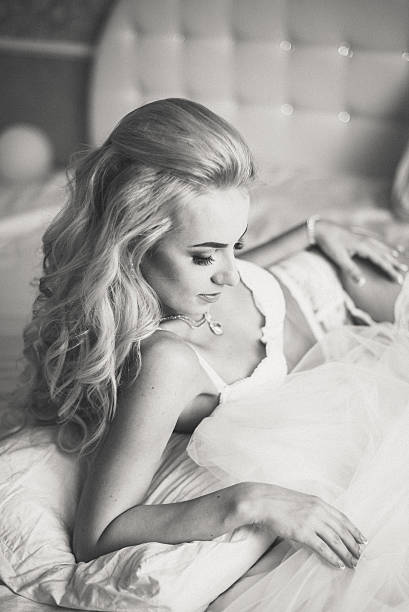 istock Beautiful women underwear lying on a bed 585789642