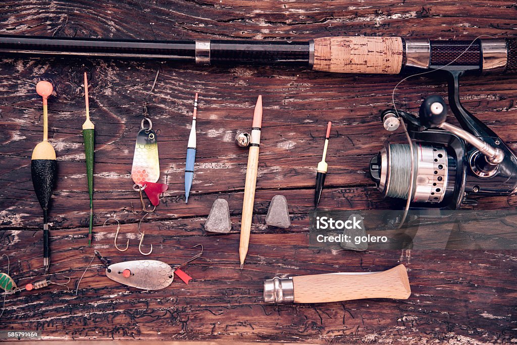 Overhead View On Old Fishing Equipment On Wooden Plank Stock Photo -  Download Image Now - iStock