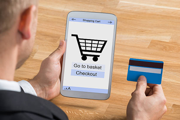 istock Businessman Shopping Online With Digital Tablet 585792306