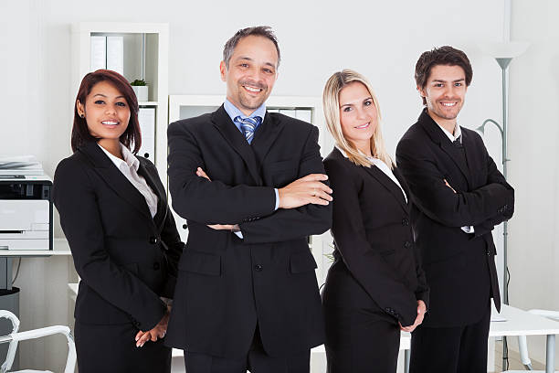 istock Confident Business Team Standing Together 585793872