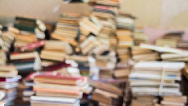 istock Books scattered in sloppy pile 585796332