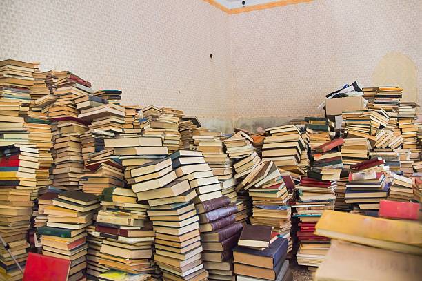 istock Books scattered in sloppy pile 585796344