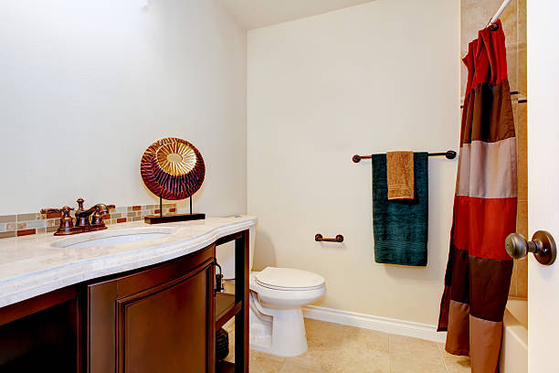 istock Simple bathroom interior in white and brown colors. 585798114