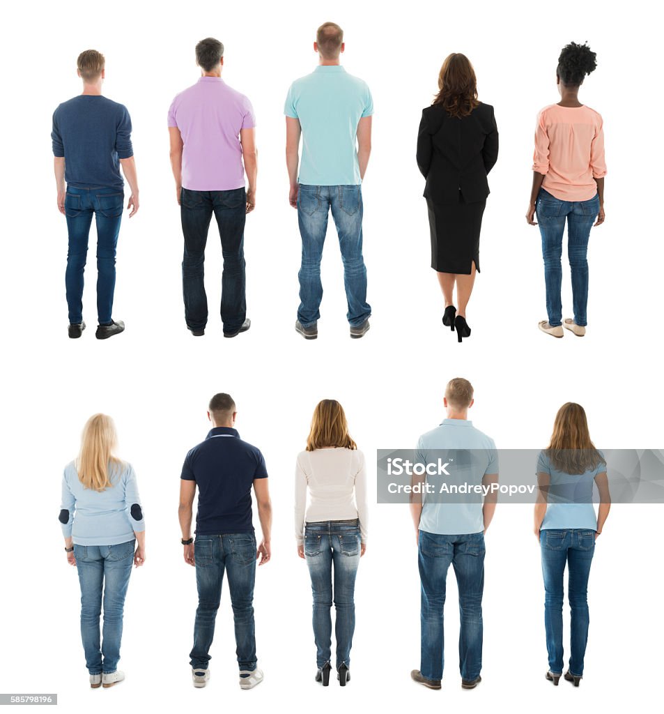 Rear View Of Creative People Standing In Row Rear View Of Creative People Standing In Row Against White Background Rear View Stock Photo