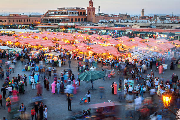 istock Evening Djemaa El Fna Square with Koutoubia Mosque, Marrakech, Morocco 585798462
