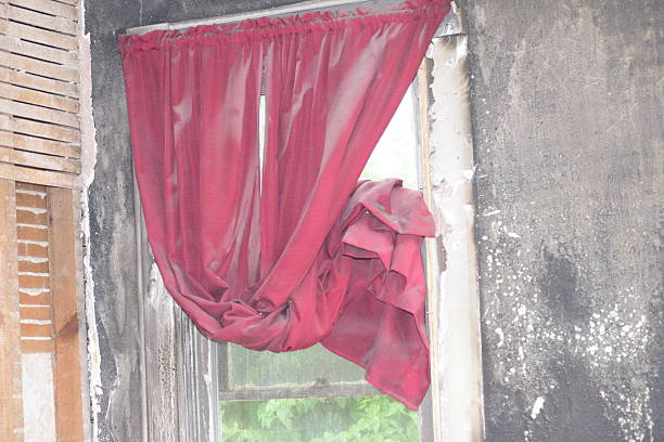 istock Red curtain in abandoned house 585799844