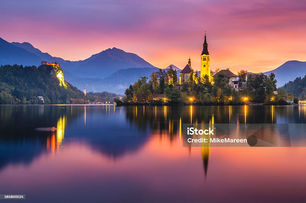 beautiful, multicolored sunrise over an alpine lake Bled in Slovenia Slovenia Stock Photo