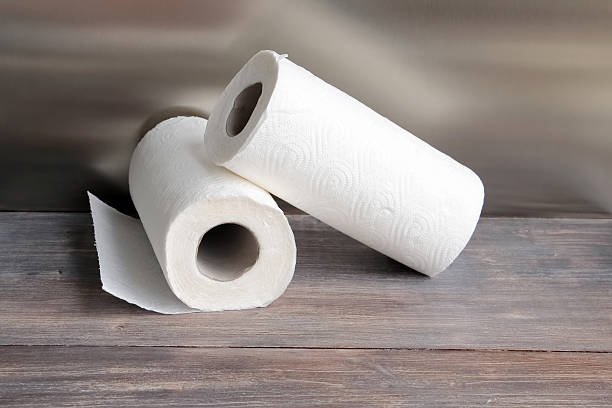 istock White kitchen paper towel on a dark wooden table 585800798
