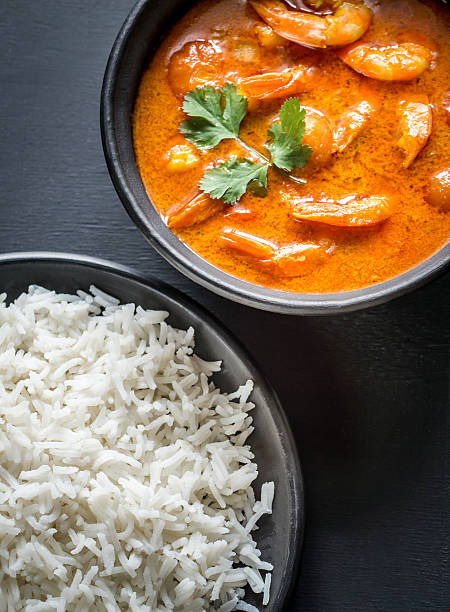 istock Thai yellow curry with seafood and white rice 585800962