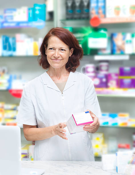 istock Female parhacist at her pahrmacy 585801320