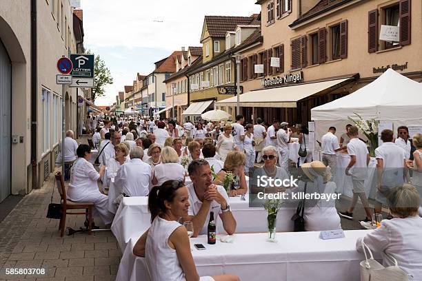 Le Diner En Blanc The White Dinner Stock Photo - Download Image Now - Dinner, Adult, Arranging