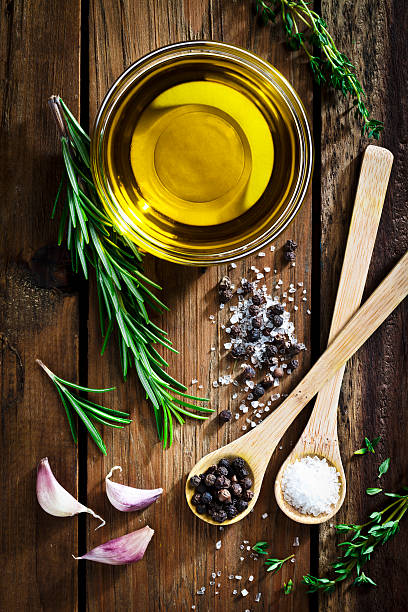 istock Flavoring: olive oil, garlic, pepper, salt and rosemary 585804162