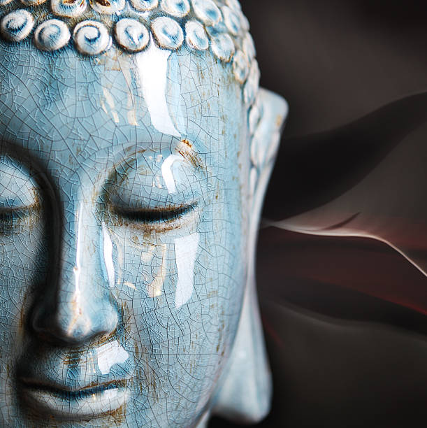 istock Buddha close up portrait 585804470