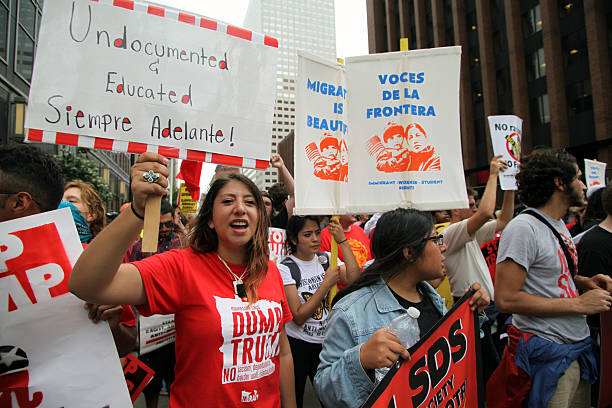 Republican National Convention, July 18, 2016 Cleveland, Ohio, USA - July 18, 2016: Young Hispanics support the Dream Act at the "Stop Trump" march on the first day of the Republican National Convention. DACA (the Deferred Action for Childhood Arrivals) program defers immigration enforcement action against young people brought to the U.S. illegally as children. rnc stock pictures, royalty-free photos & images