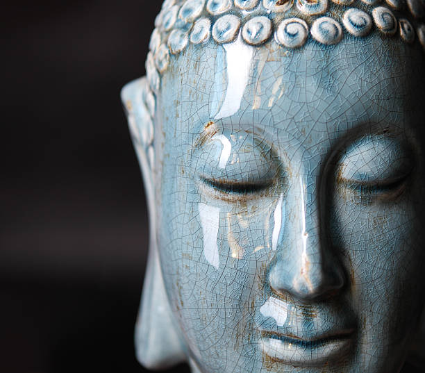 istock Buddha close up portrait 585804516