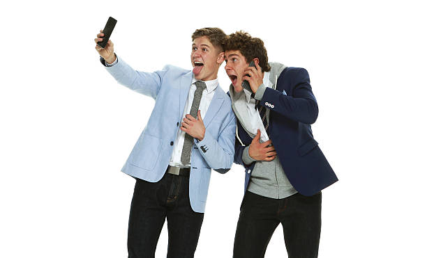 istock Brothers taking a selfie and being silly 585806454