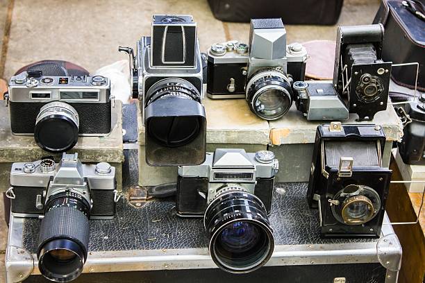 istock vintage cameras at flea market 585807358