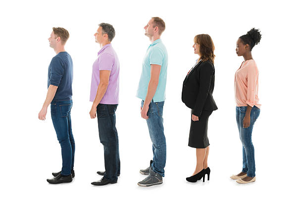 istock Creative Business People Standing With Manager In Row 585807968