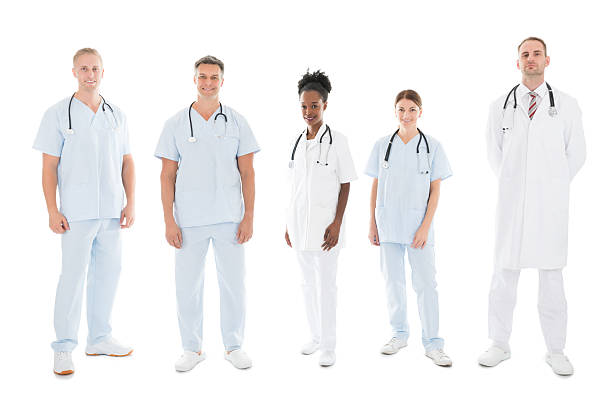istock Confident Multiethnic Medical Team Standing In Row 585808108