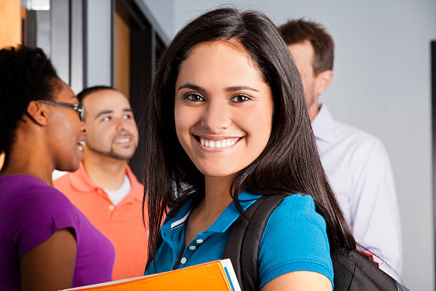 istock Education: Multi-ethnic group of college students in classroom. 585810672