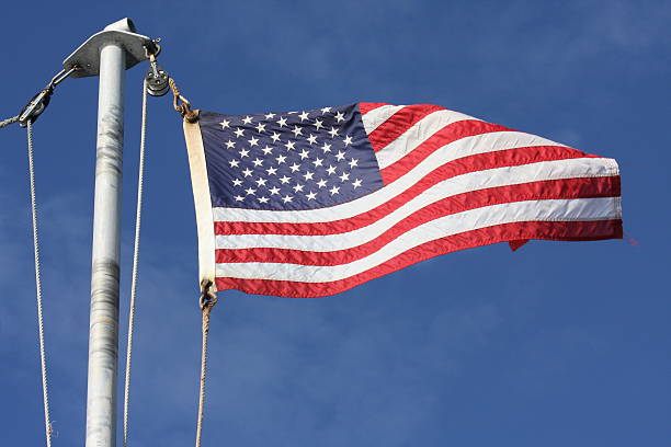 istock American Flag At Sea 585810736