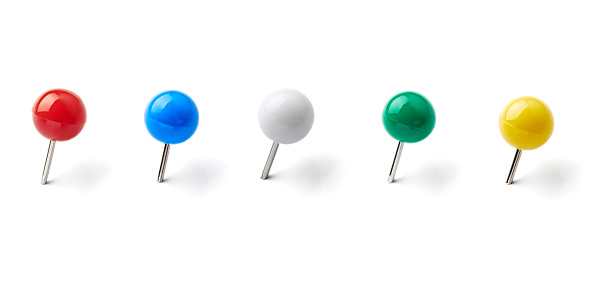 collection of various pushpins on white background. each one is shot separatelyclose up of a pushpin on white background with clipping path