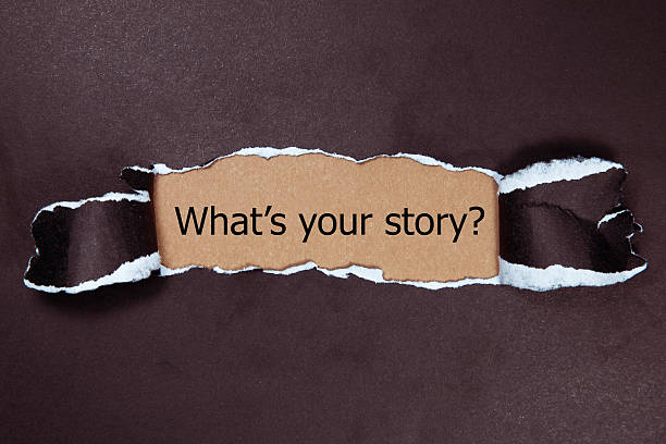 istock Text 'What's your story?' appears under the torn paper. 586043598