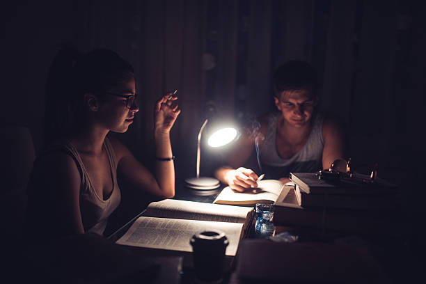 istock Students lerning and smoking at night 586045588