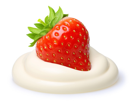 Cream with berry strawberry isolated on white background.