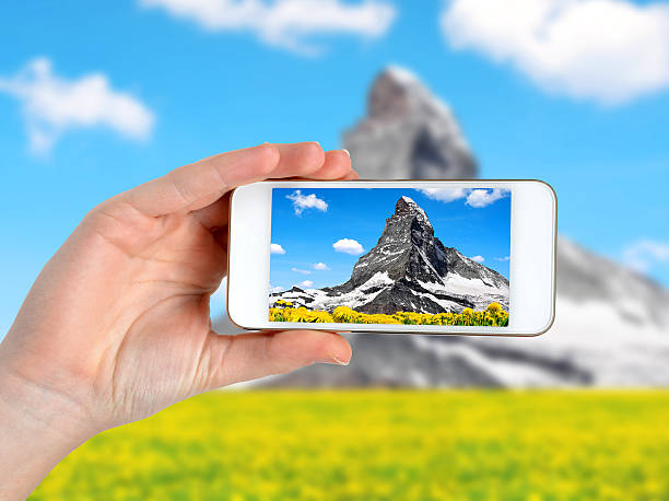 istock Person is taking photo with a smartphone. 586051506