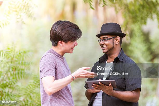 Dude This Is The New App Which I Developed Stock Photo - Download Image Now - Digital Tablet, Fedora, Adolescence