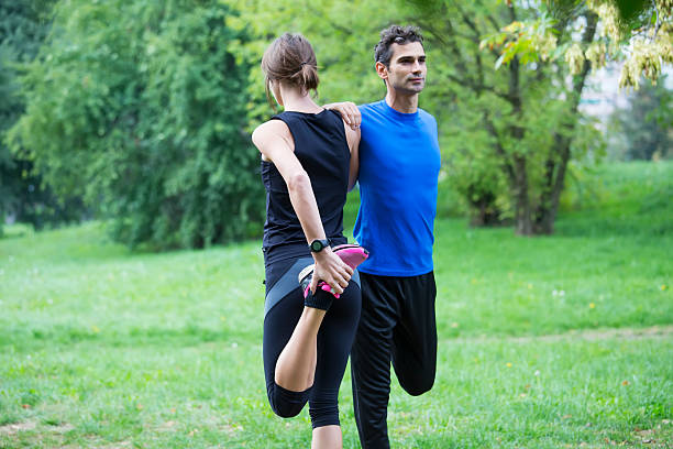 istock Young couple training in the park 586052458