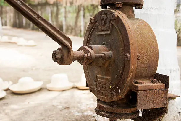 An old hand water pump in Manta - Ecuador
