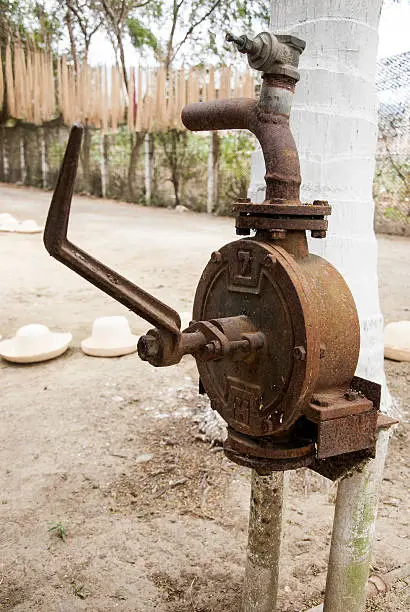 An old hand water pump in Manta - Ecuador