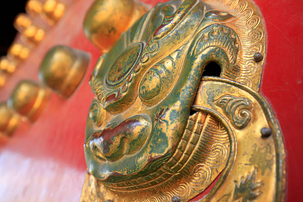istock Ancient Chinese architecture copper door knocker 586054926