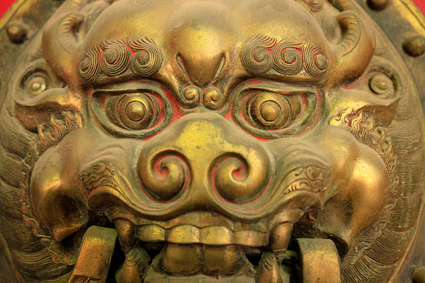 istock Ancient Chinese architecture copper door knocker 586056988