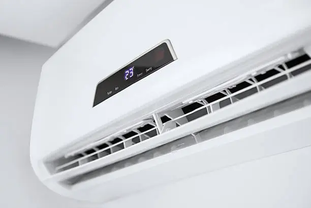 Photo of Split air conditioner on a white wall.