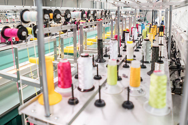 istock Embroidery machine at a clothing factory 586058762