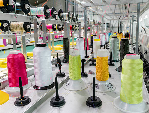 istock Embroidery machine at a clothing factory 586058836
