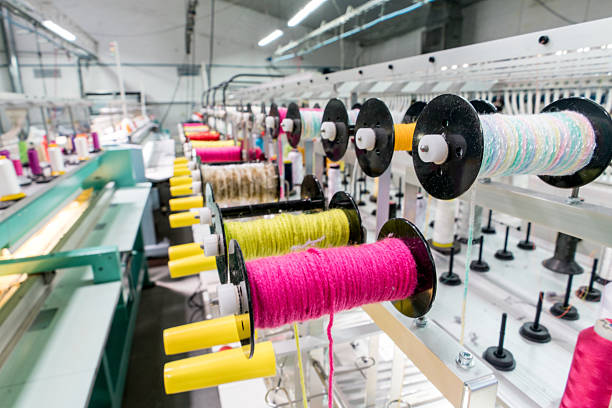 istock Embroidery machine at a clothing factory 586058866