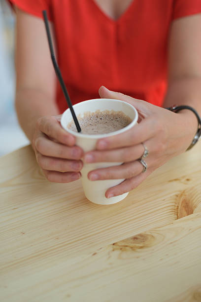 istock hand derat cup of cocoa 586058998