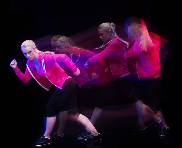 istock Multiple Exposure - Sports woman moving 586060716