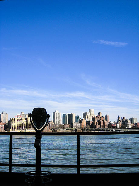 istock Binocular in blue sky, South Street Seaport 586063512